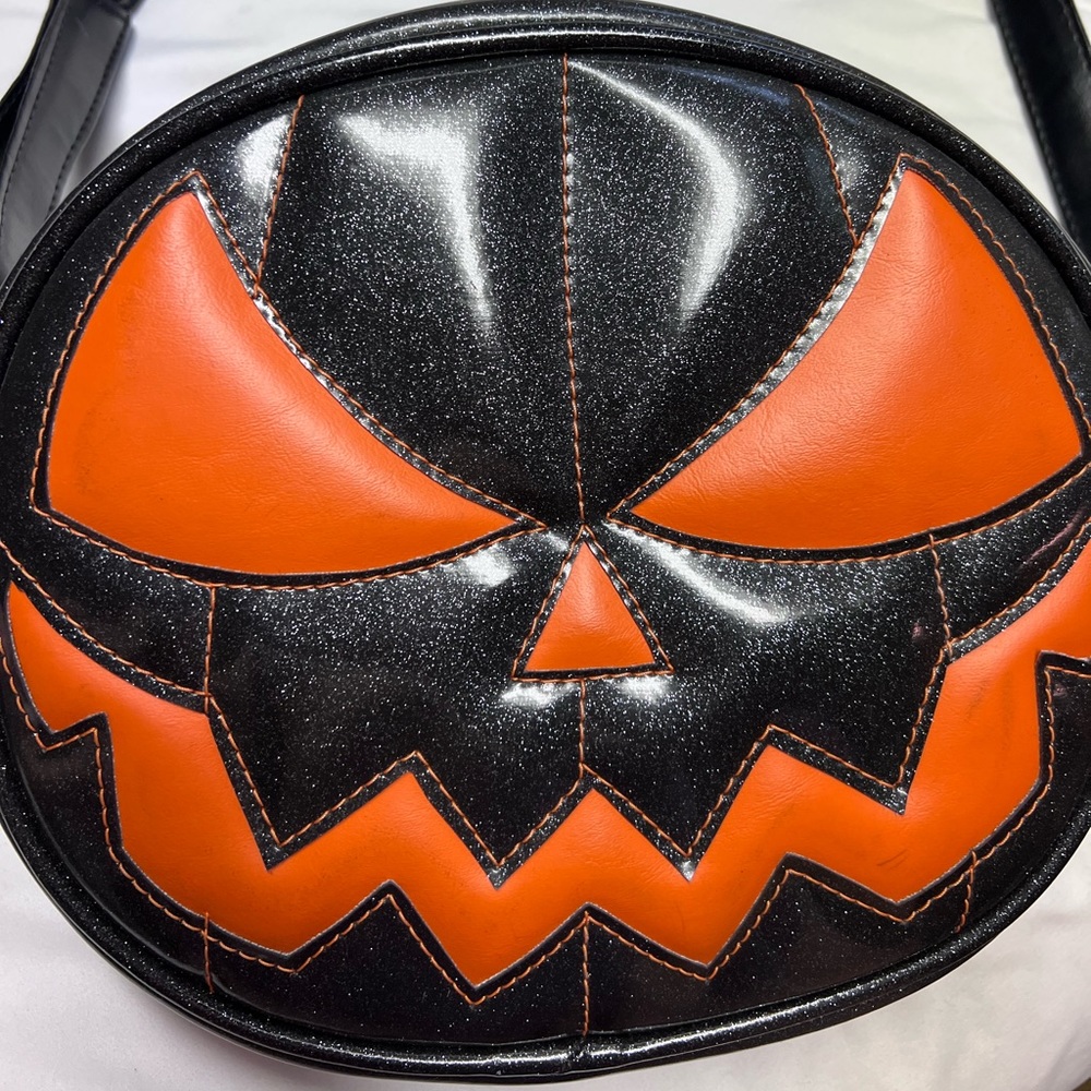 Love pain and stitches pumpkin purse